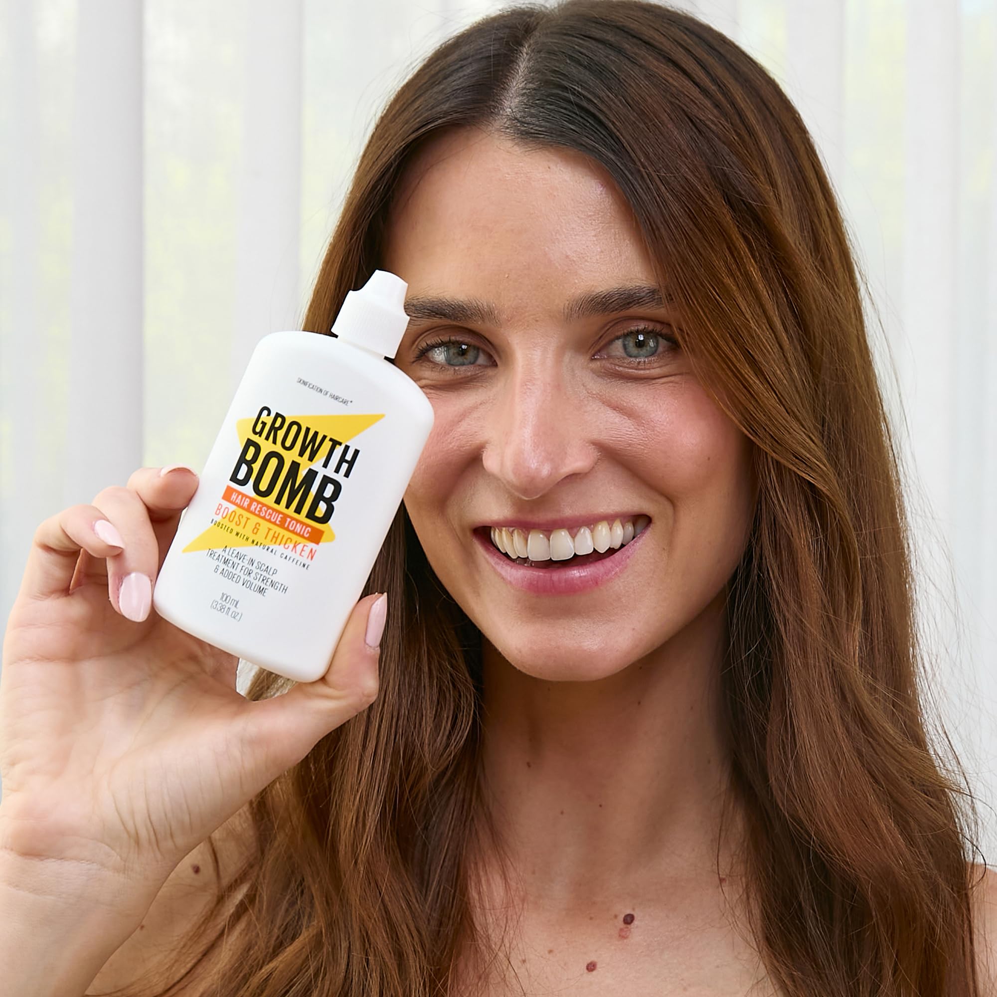 Growth Bomb scalp serum packaging showing caffeine and Redensyl ingredients