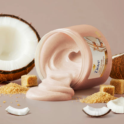 Scooped creamy coverage of Dove coconut butter exfoliating cream for dry skin nourishment.