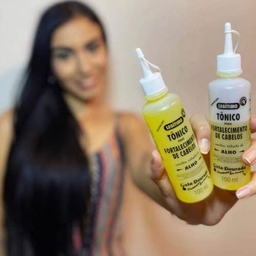 Gota Dourada anti dandruff and anti hair loss tonic bottle displayed on a clean premium background