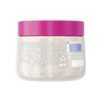 Dove exfoliating body polish jar open showing whipped texture