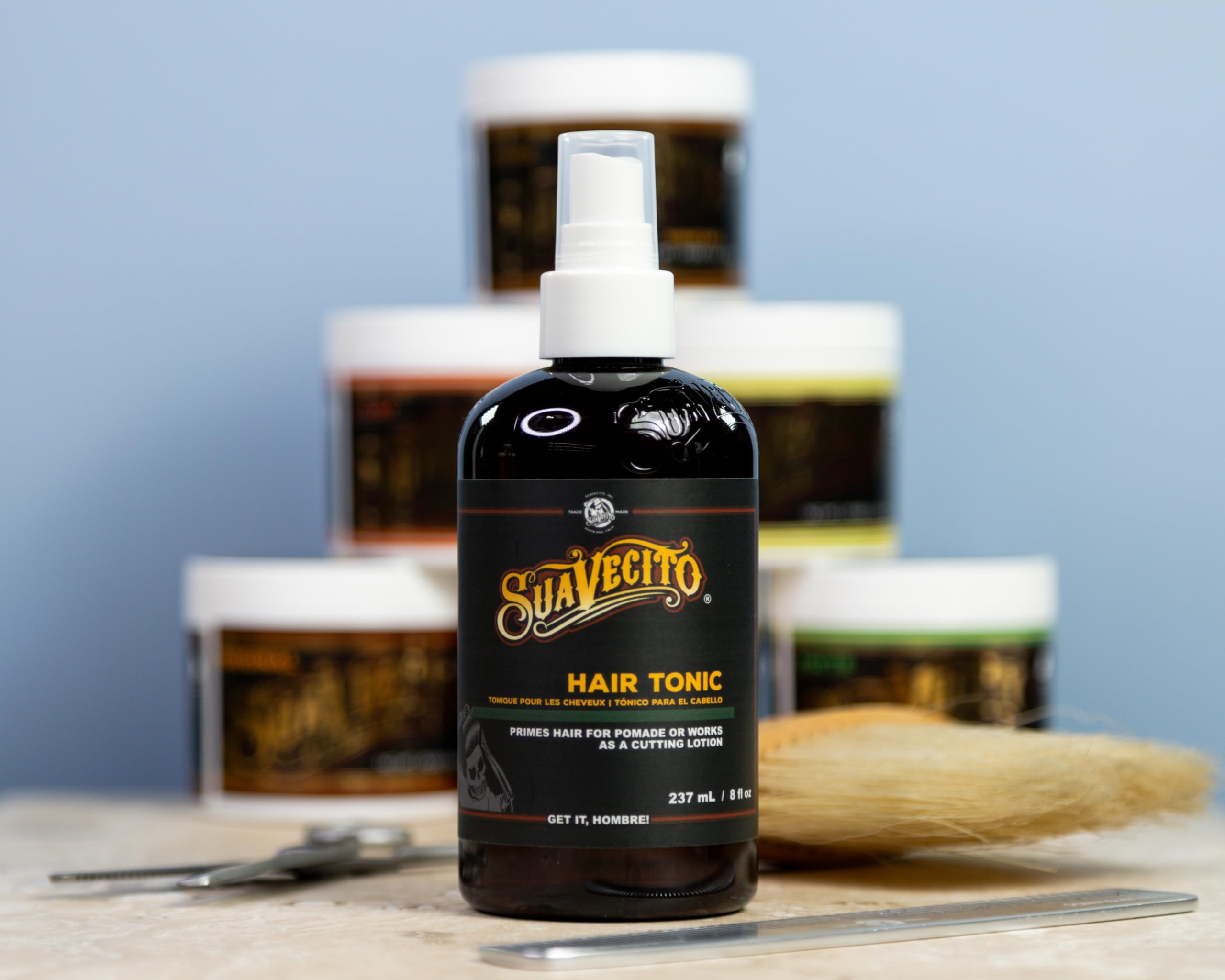 Barbershop style Suavecito hair tonic bottle on a clean background