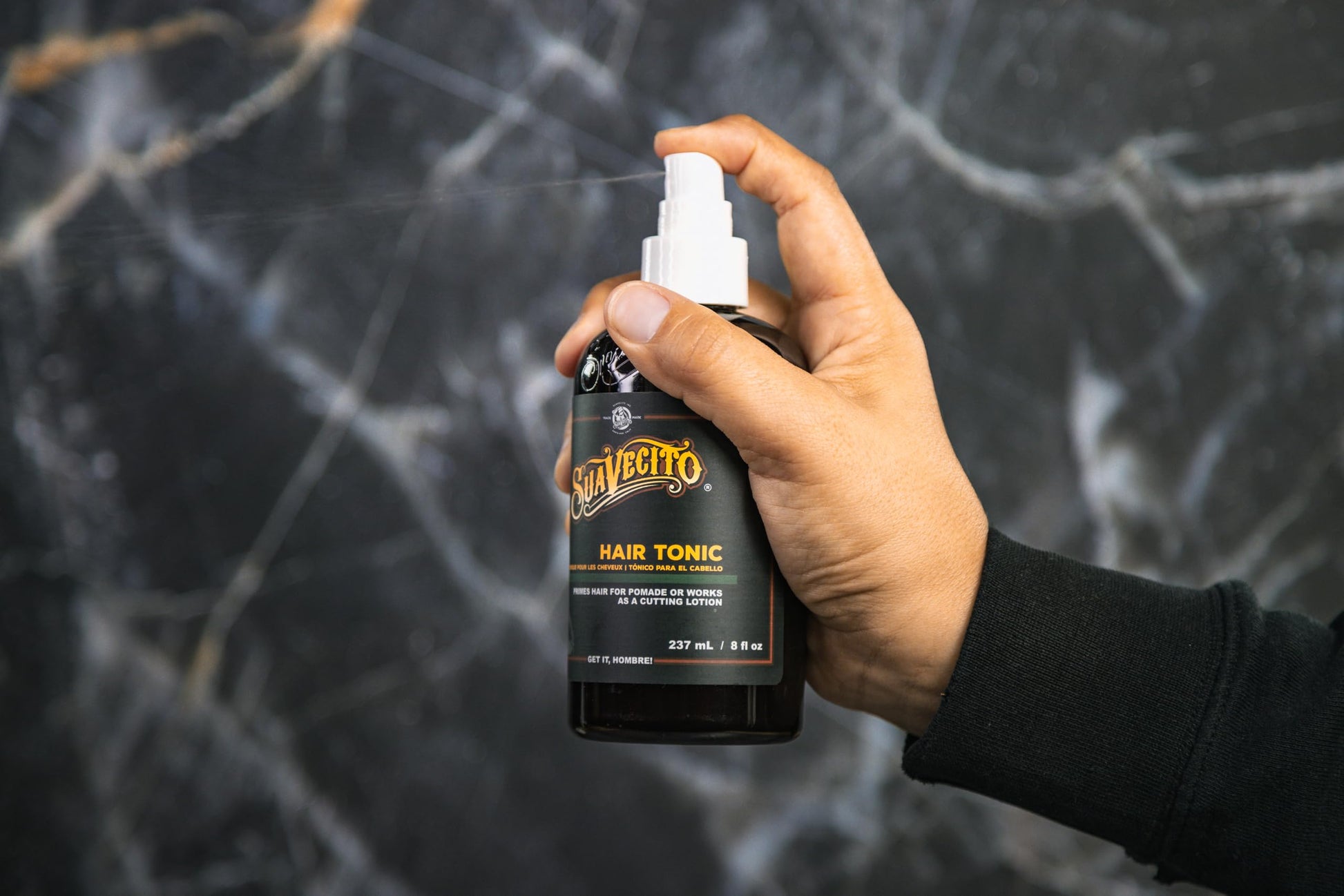 Suavecito lightweight hair tonic spray for combating dryness and breakage