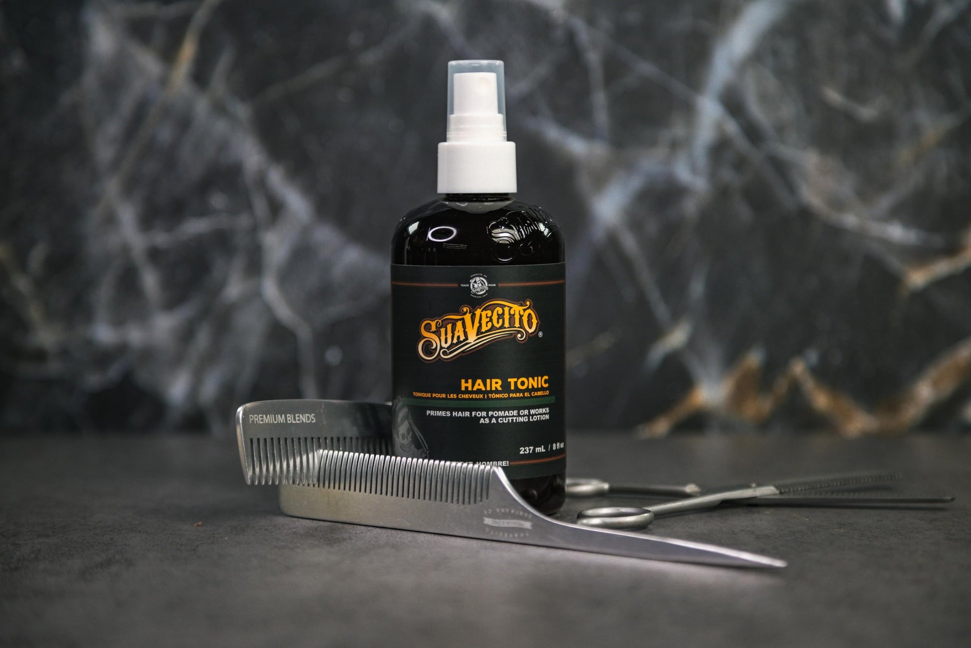 Suavecito hair tonic mist bottle detailing the premium packaging design