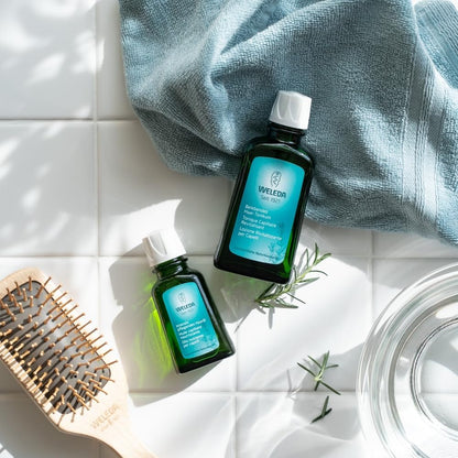 Lightweight vegan hair loss tonic bottle close up for scalp care