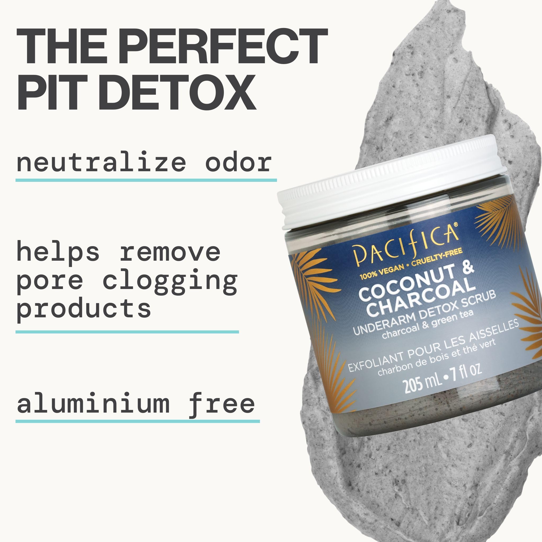 Jar of Pacifica underarm body scrub next to natural coconut ingredients on clean surface