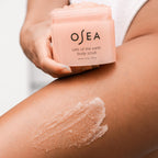 Osea salt scrub jar label showing brand details and product title