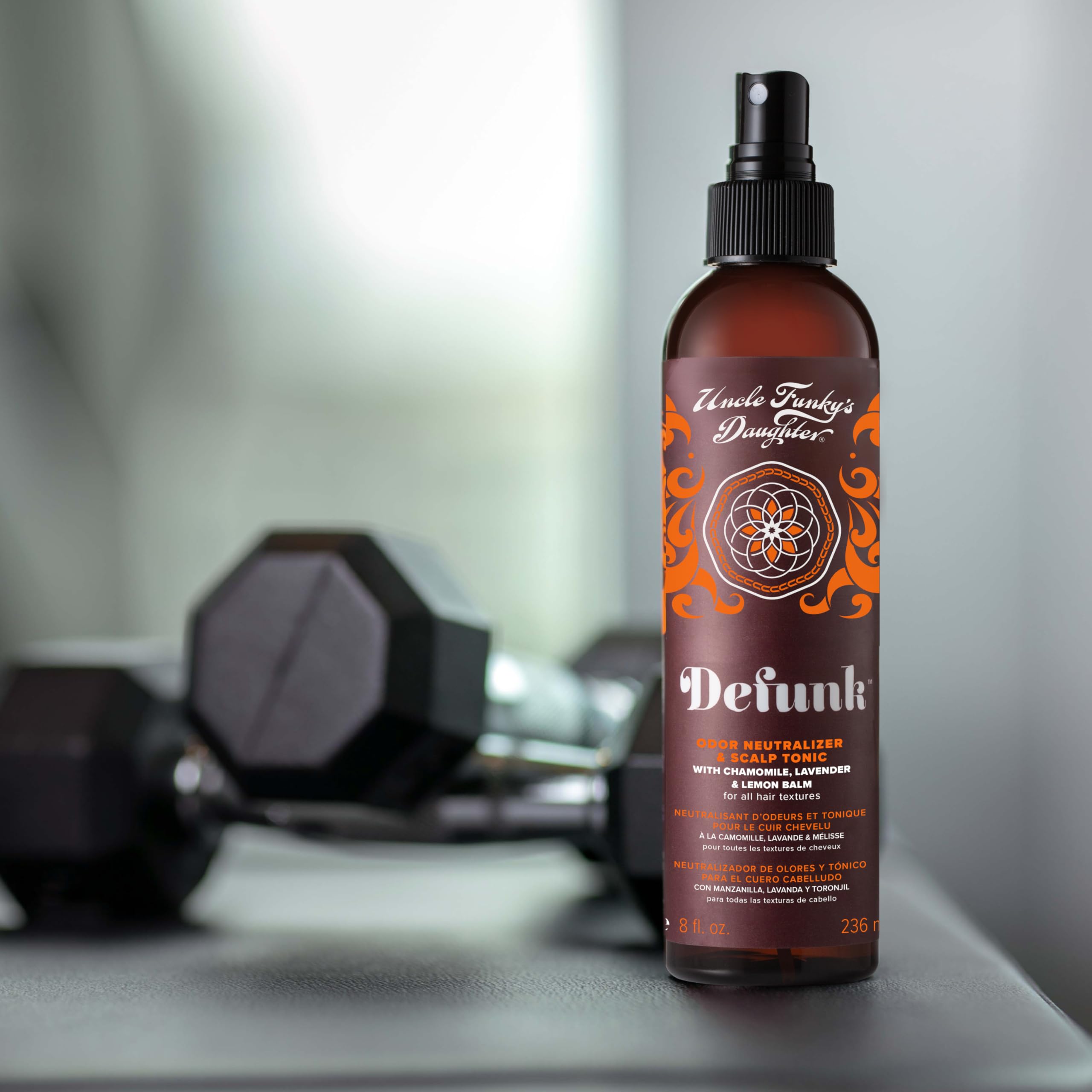 Uncle Funky's Daughter Defunk hair tonic spray nozzle and application design