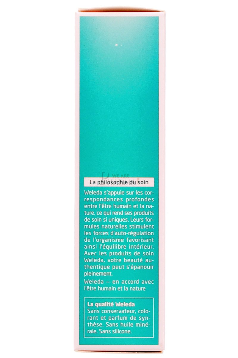 Liquid texture of Weleda scalp revitalising treatment being applied to roots