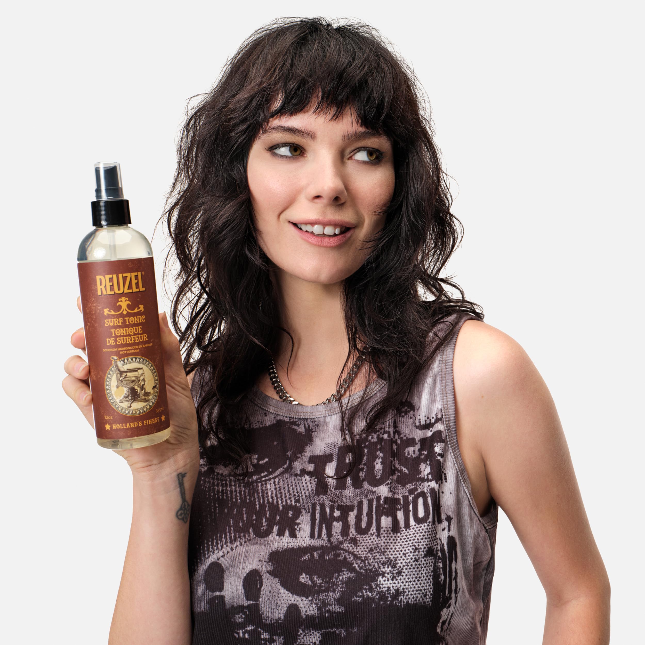 Back label of Reuzel Surf Tonic hairspray detailing the usage directions and full ingredients list