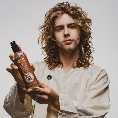 Reuzel Surf Tonic 355ml bottle displaying the vegan formula and windblown style benefit markers
