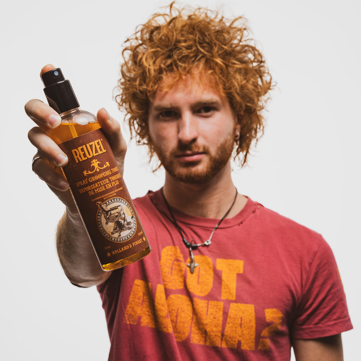 Reuzel barber grade styling tonic for texture and high lift