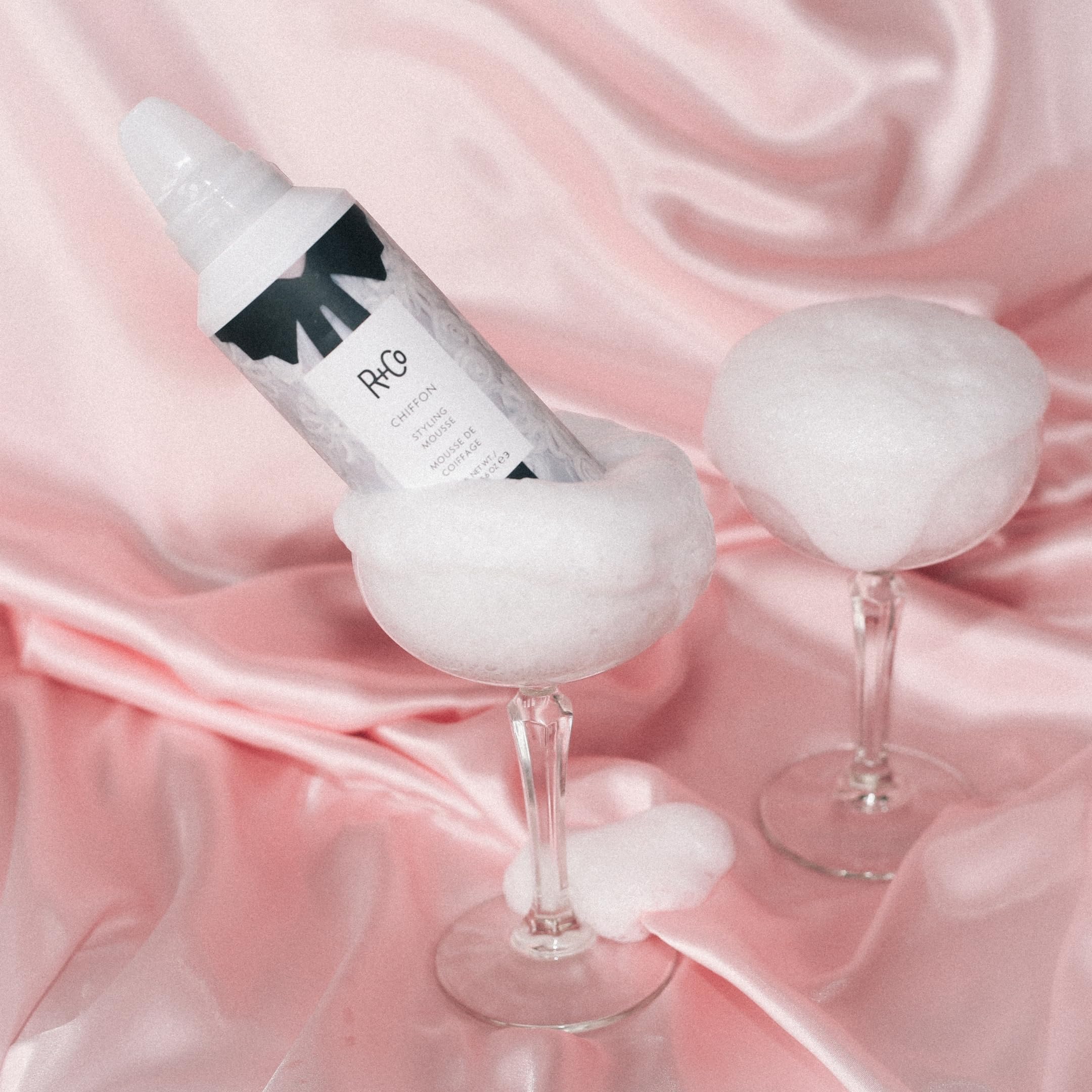 Premium imported R+Co hair foam for heat protection and color preservation.
