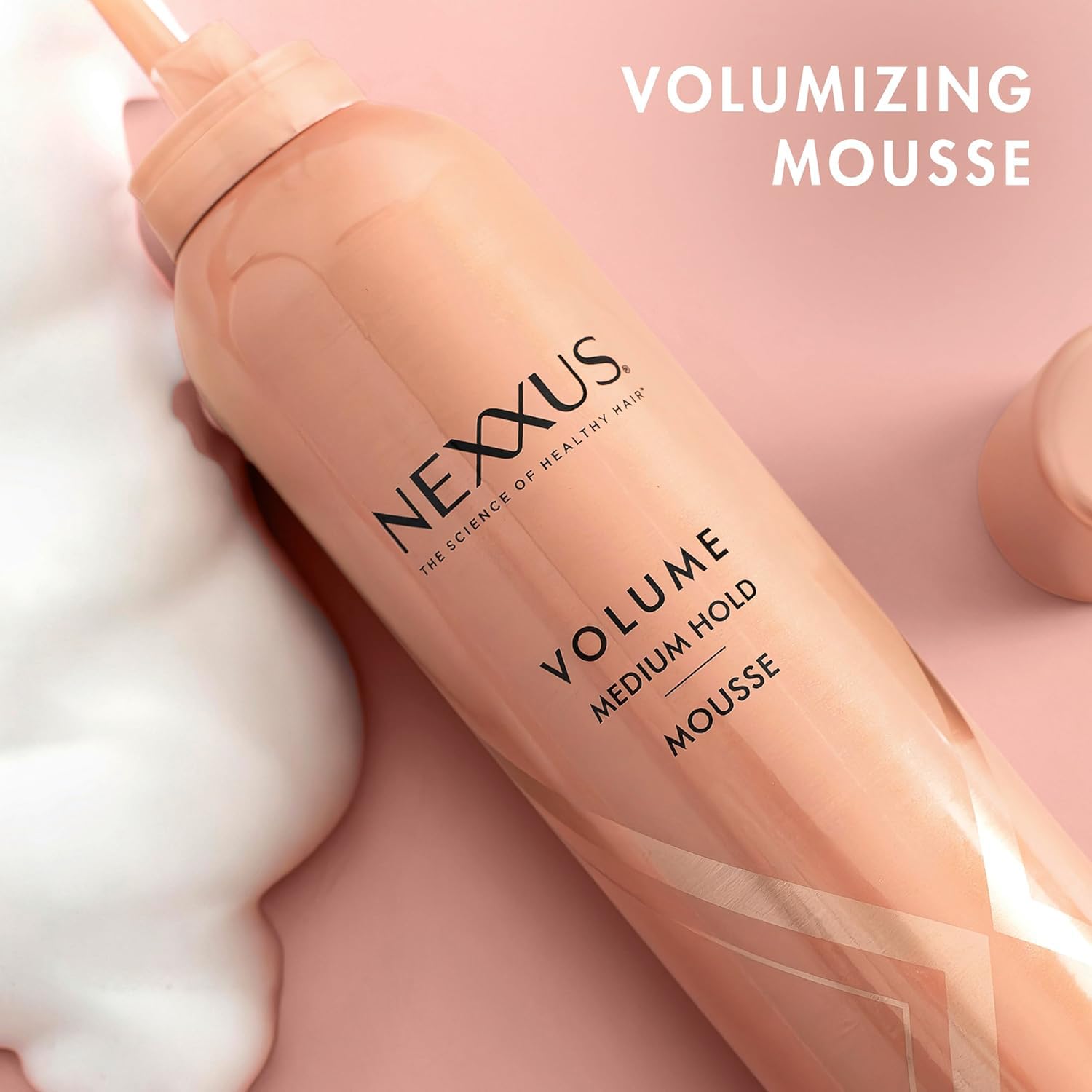 Nexxus hair mousse styling application on damp hair
