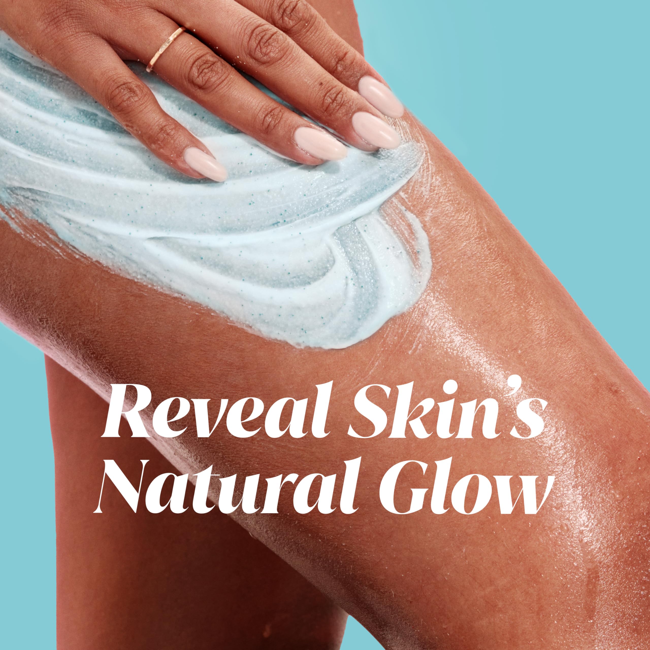 Olay massaging pearls body scrub cream texture close up demonstration.