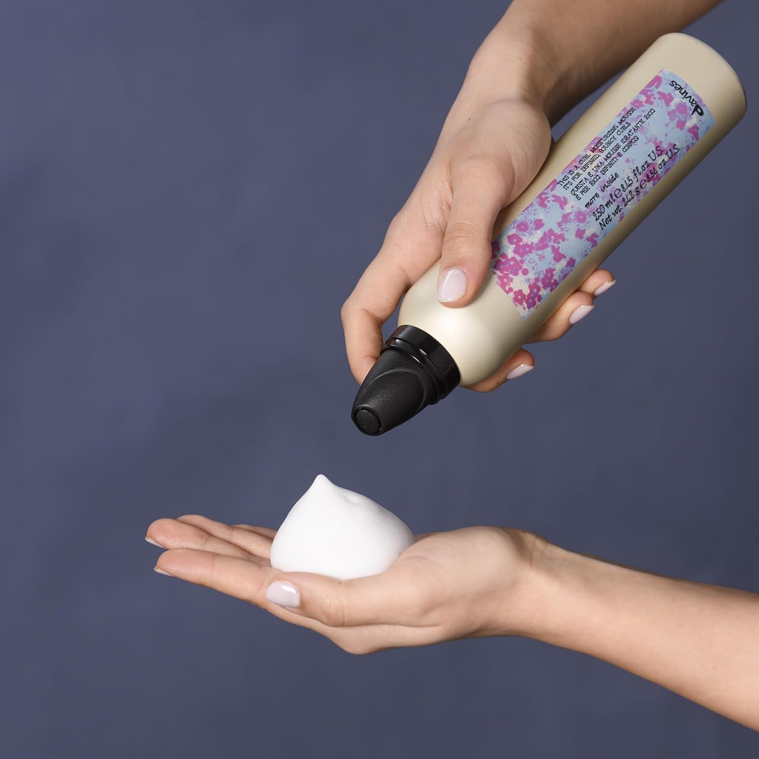 Creamy mousse formula for defined curls and medium hold styling flexibility