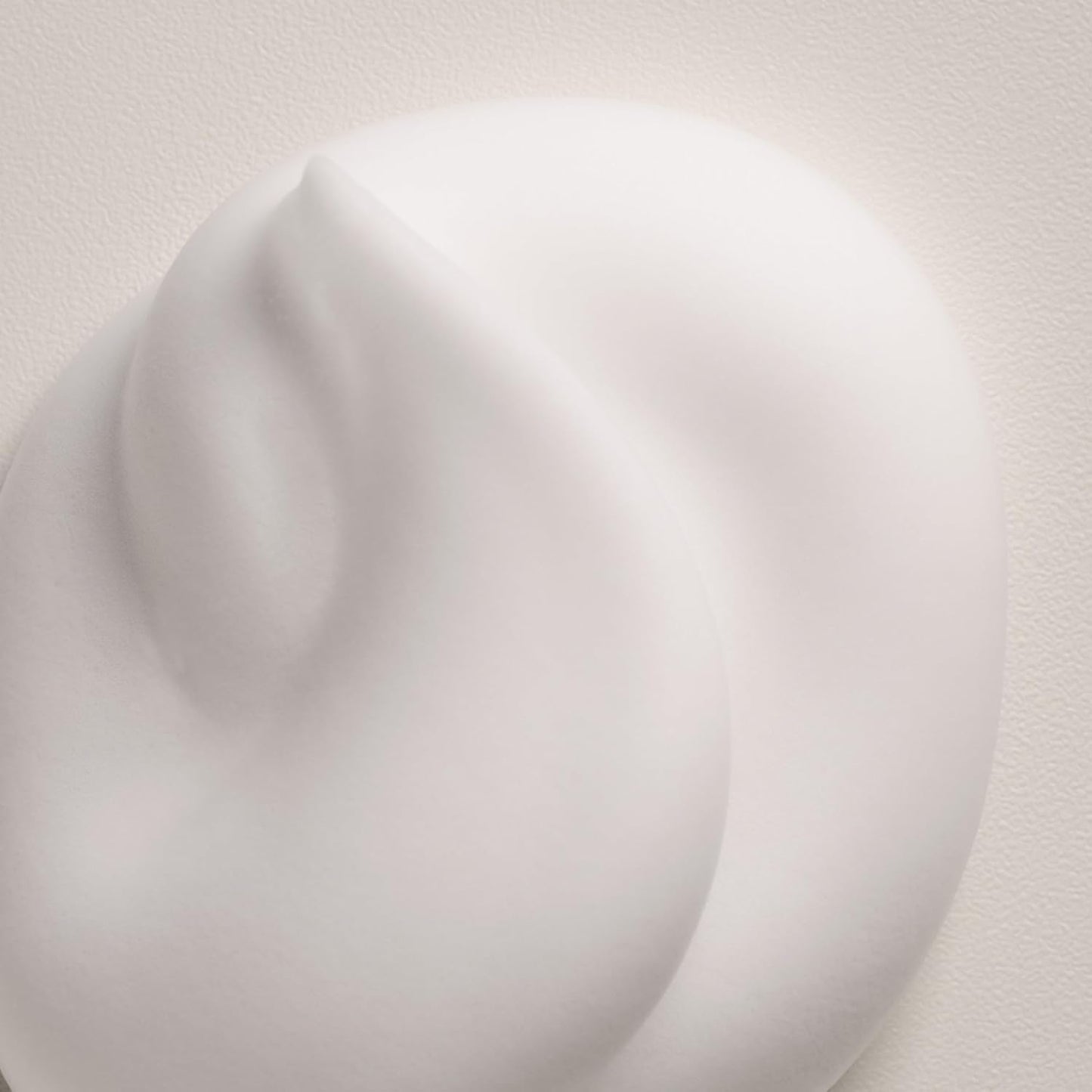 Anti frizz hair mousse by Davines showing product details and size