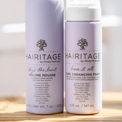 Side profile of Hairitage 5 fluid ounce mousse bottle