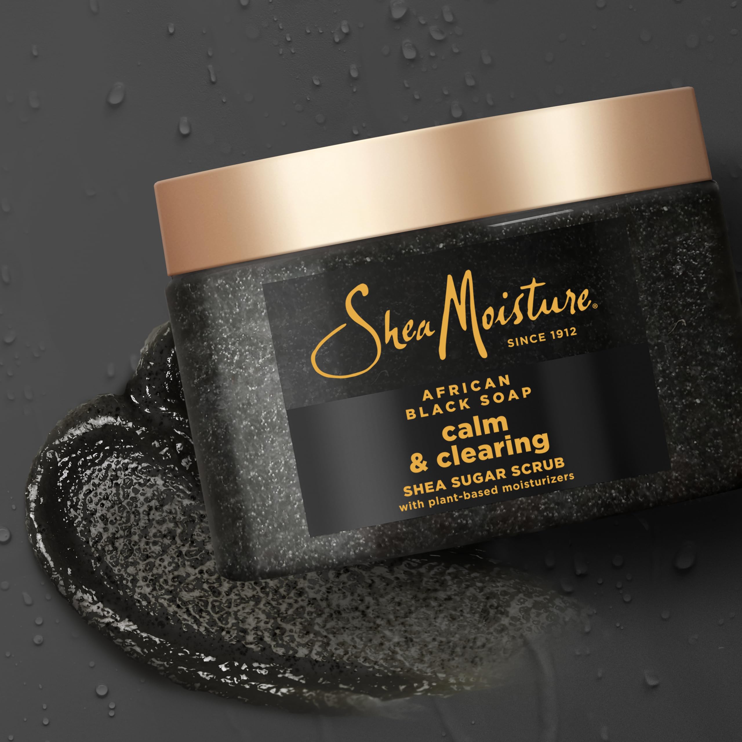 Back label details of SheaMoisture twelve ounce body scrub with ingredients list