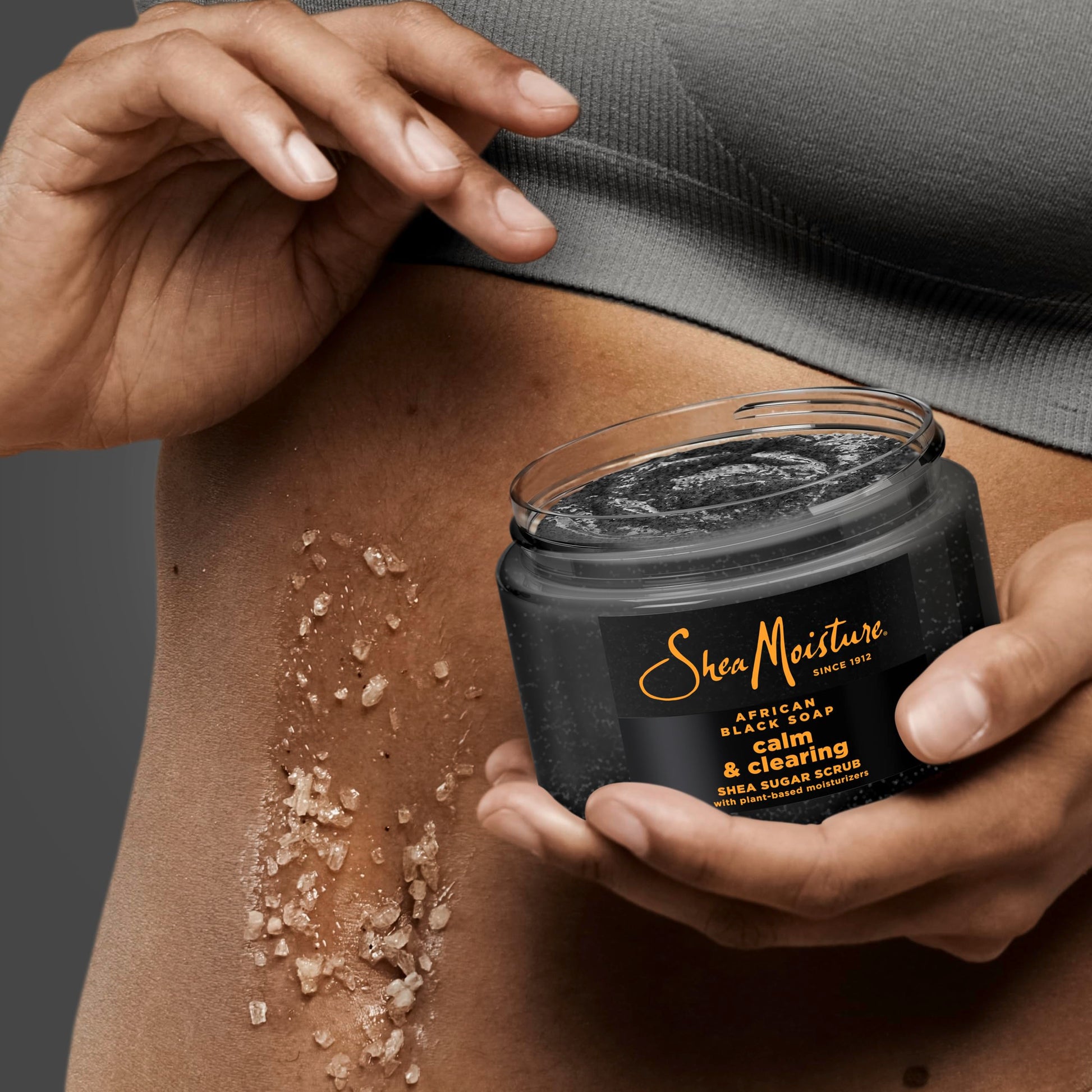 SheaMoisture natural skincare product packaging displaying fair trade shea butter logo
