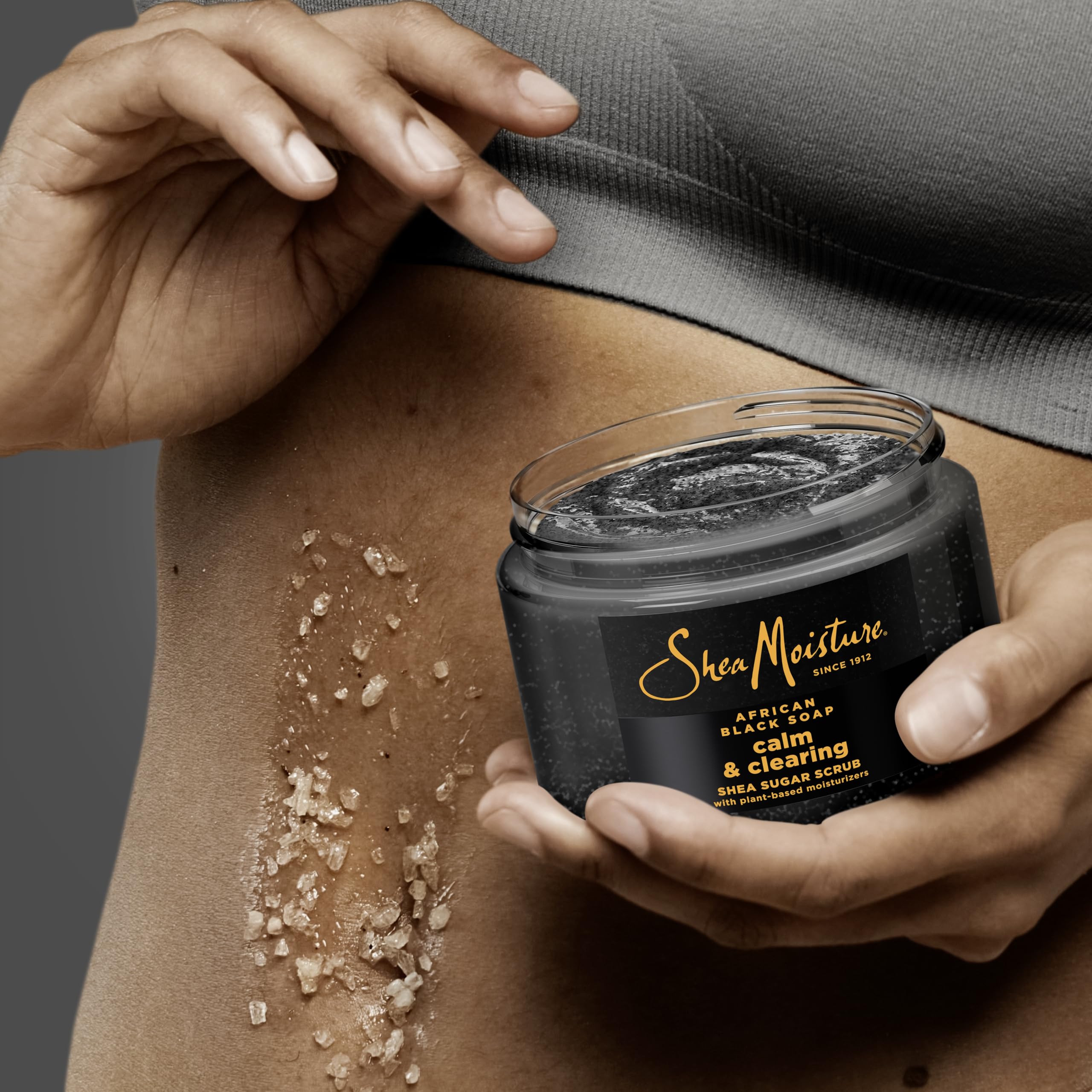 SheaMoisture natural skincare product packaging displaying fair trade shea butter logo
