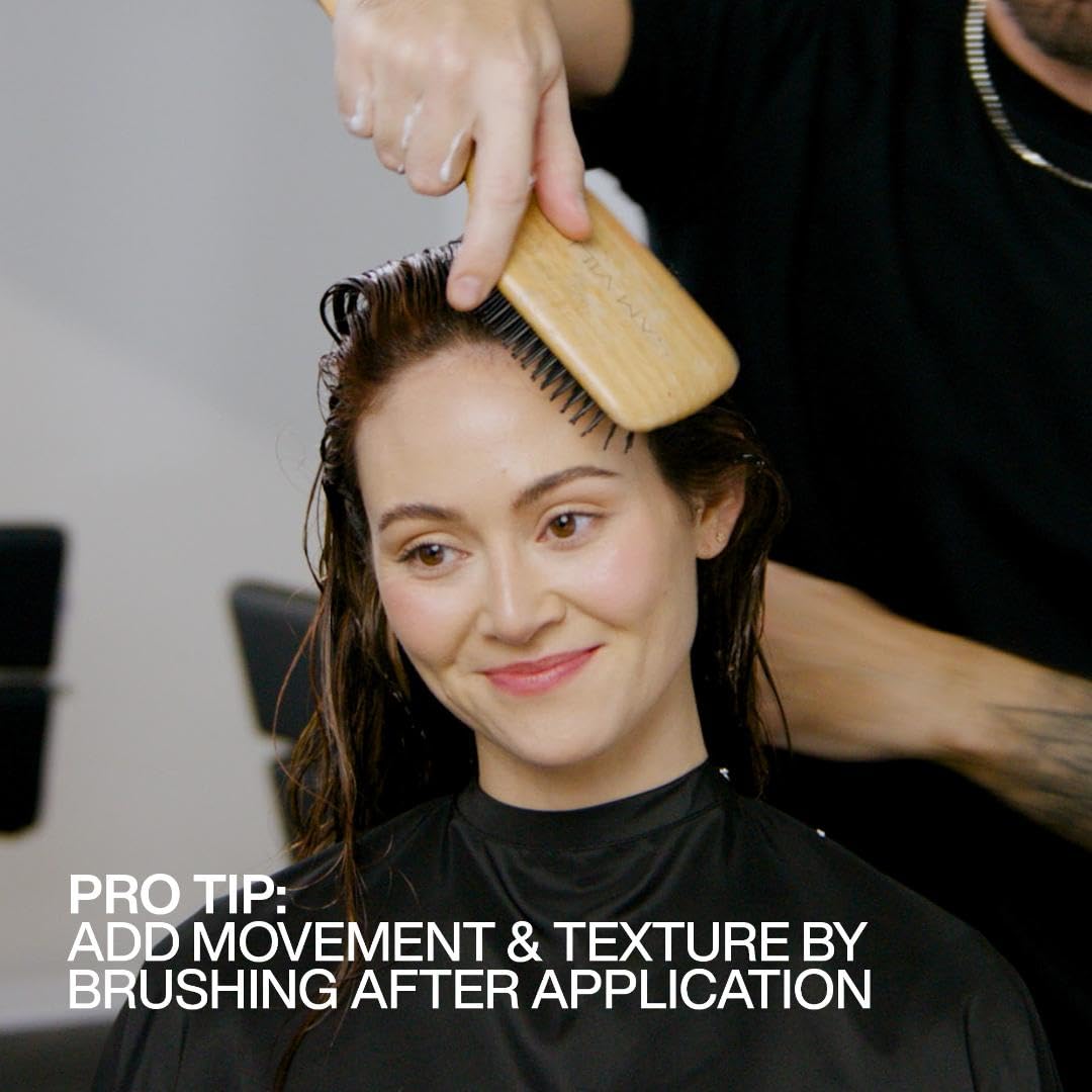Professional hair volume result using Redken mousse