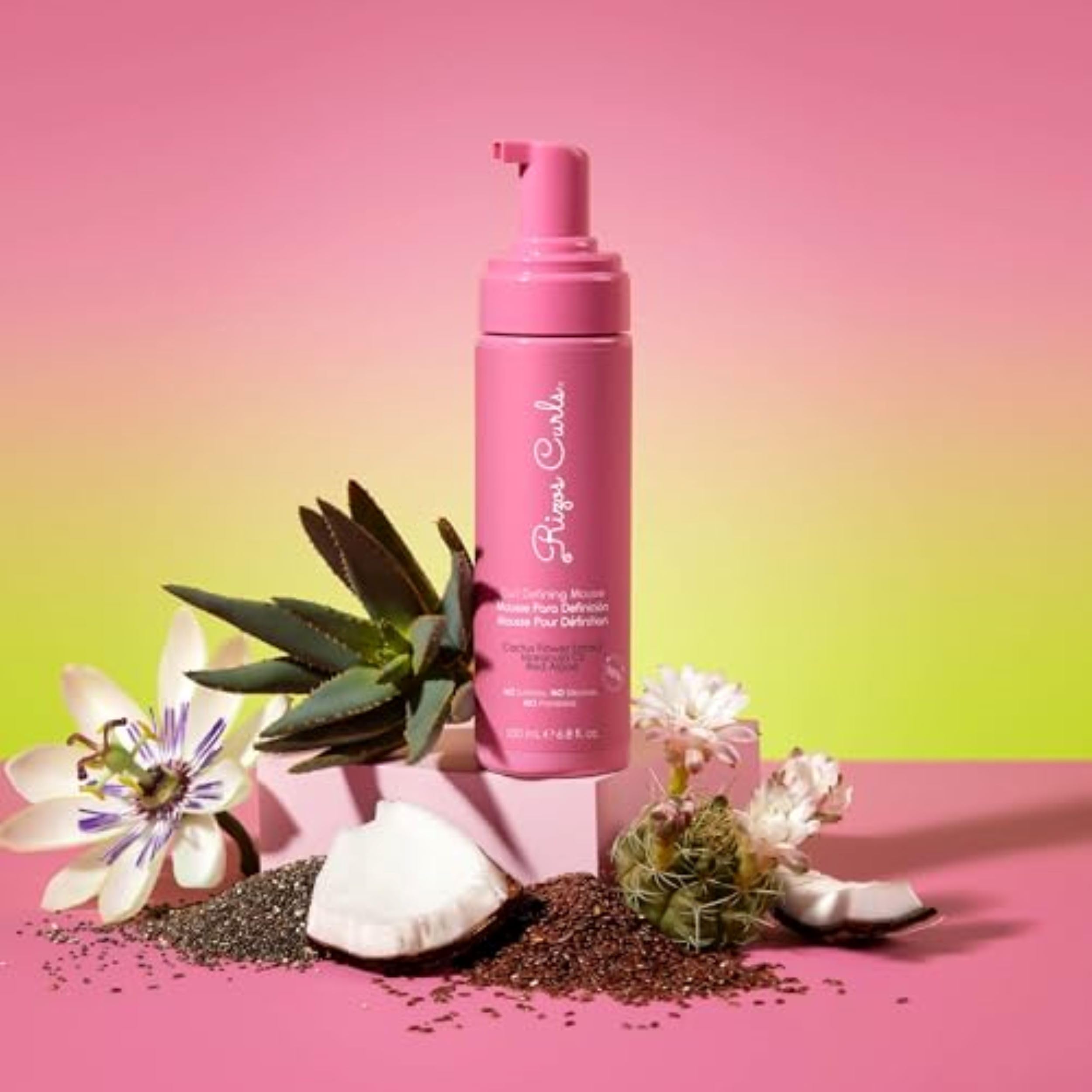 Rizos Curls Curl Defining Mousse lightweight styling foam texture on hand