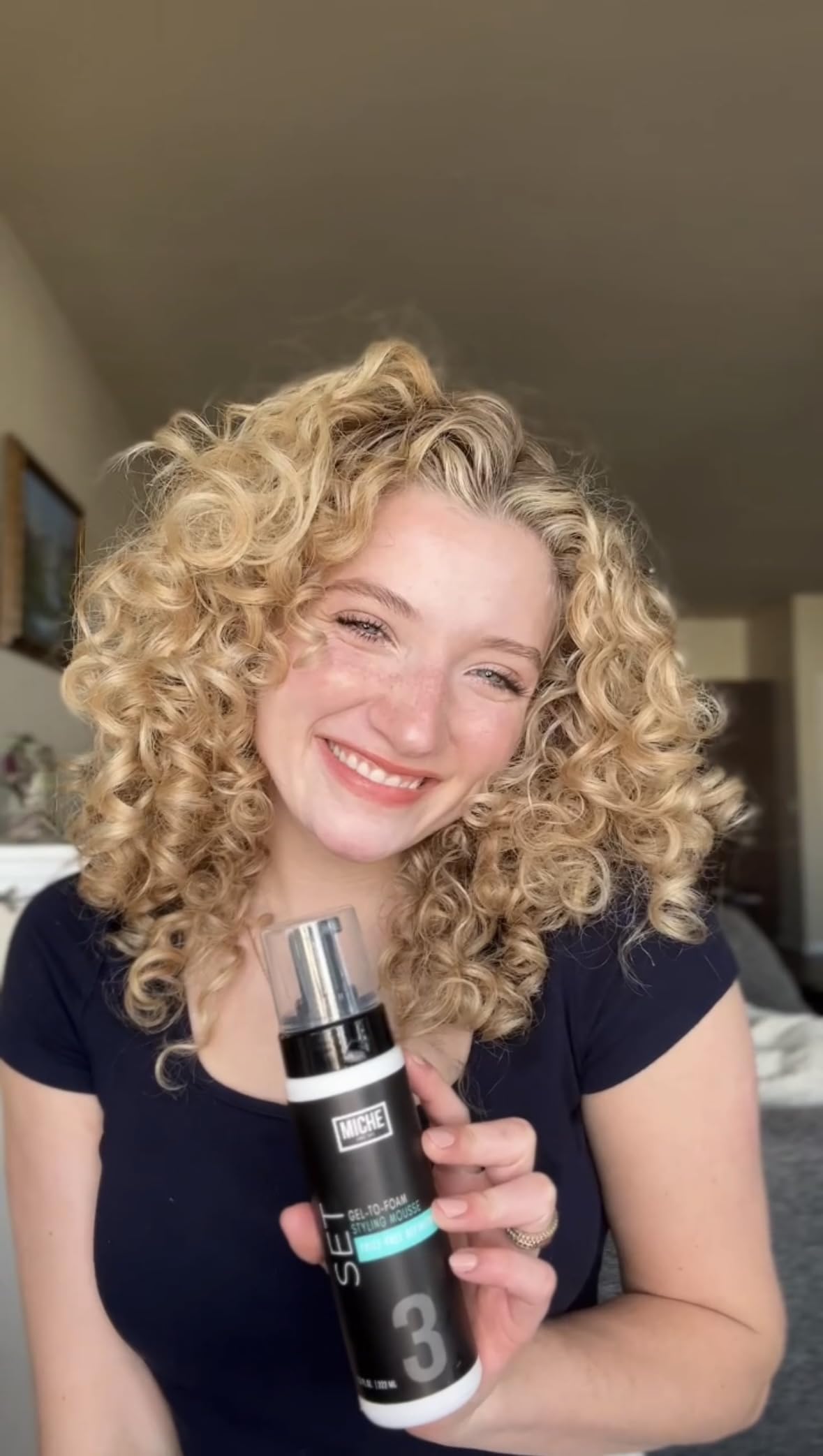 Miche Beauty 7.5 fluid ounces styling foam for frizz control and wave definition.