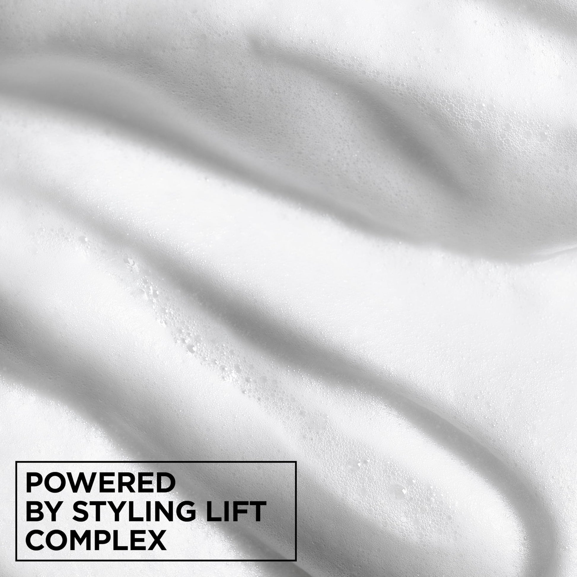 Garnier Fructis hair styling mousse showing the twenty four hour hold icon