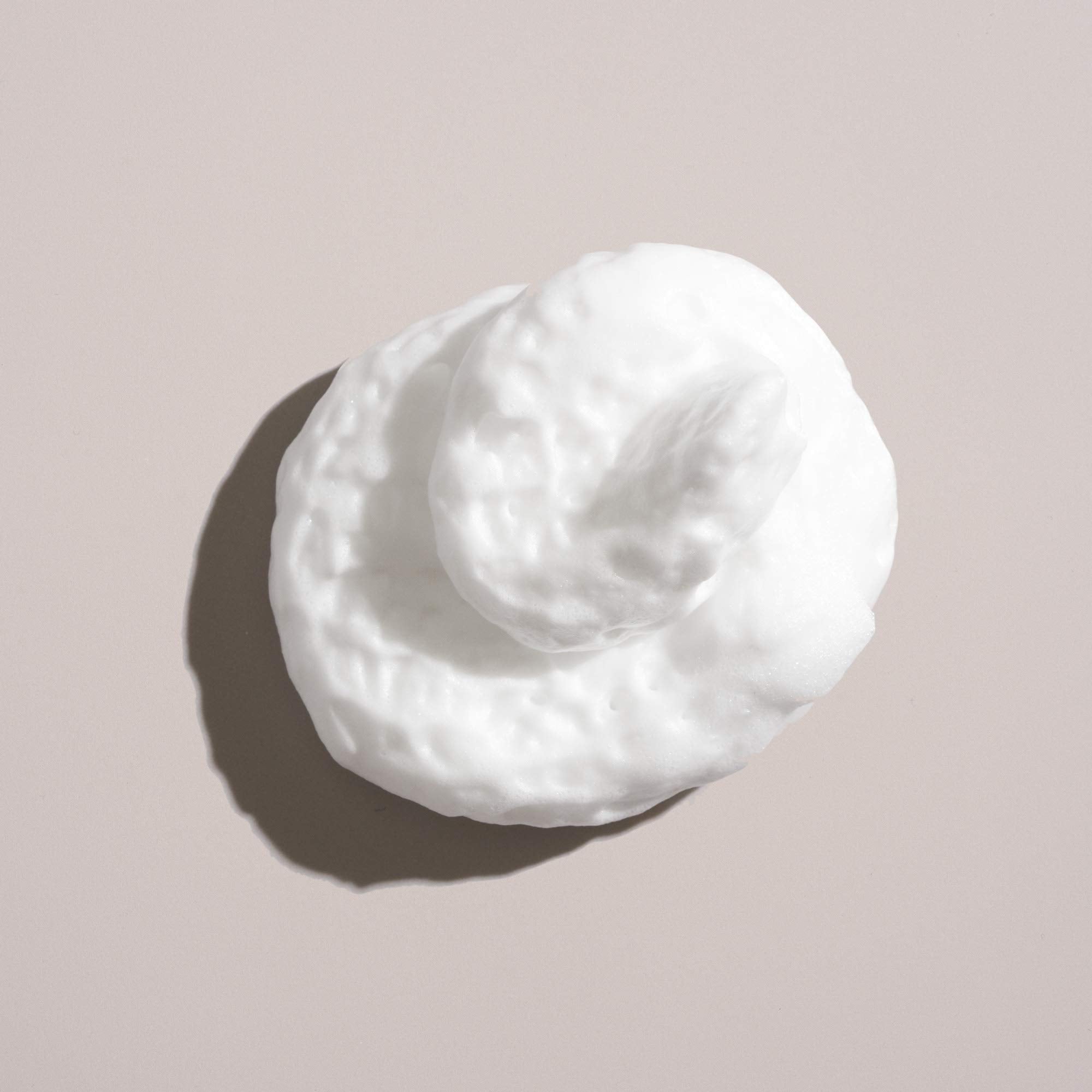 Oribe grandiose hair foam showing clean ingredient and usage label