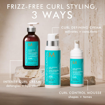Moroccanoil hair mousse close up showing the brand name and product details