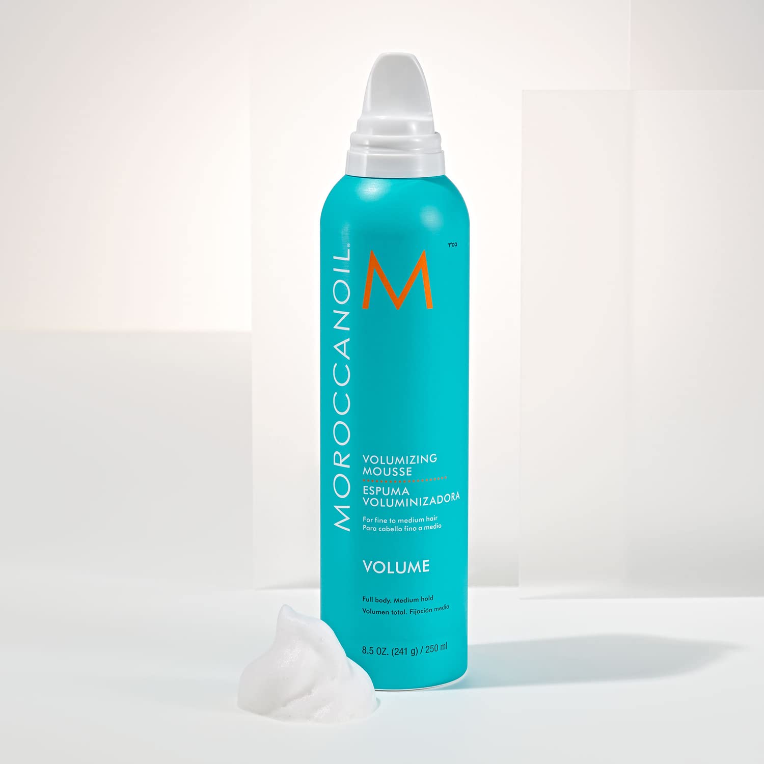 Weightless medium hold volumizer mousse bottle angle shot