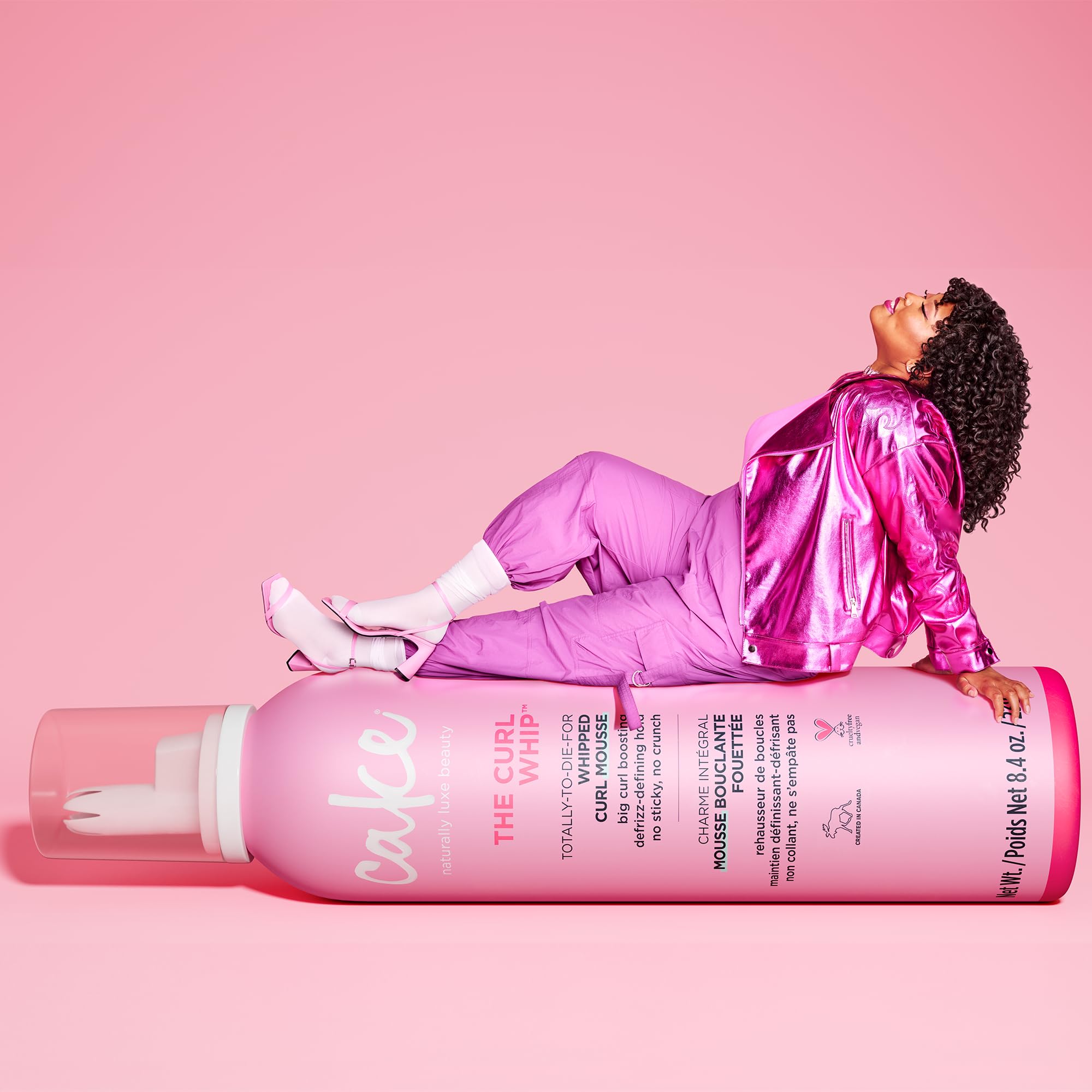 Cake Beauty volumizing mousse container showcasing aloe vera and vitamin E details
