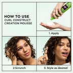 Garnier Fructis green aluminum bottle styling mousse for defining waves and coily hair patterns.