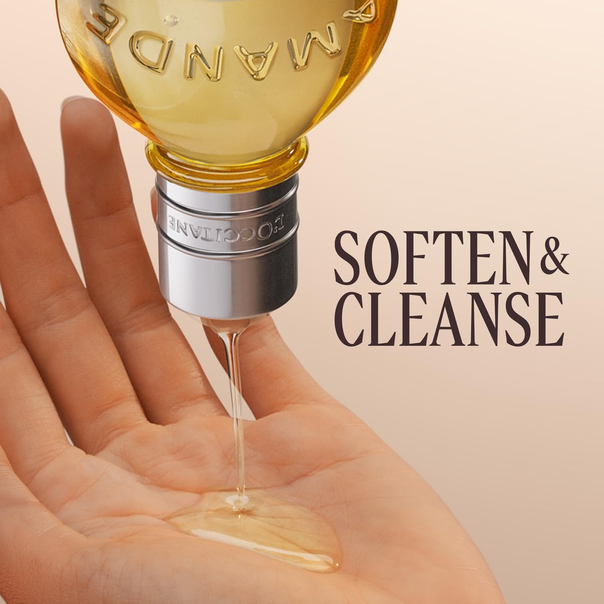 L'Occitane almond shower oil texture showing milky lather