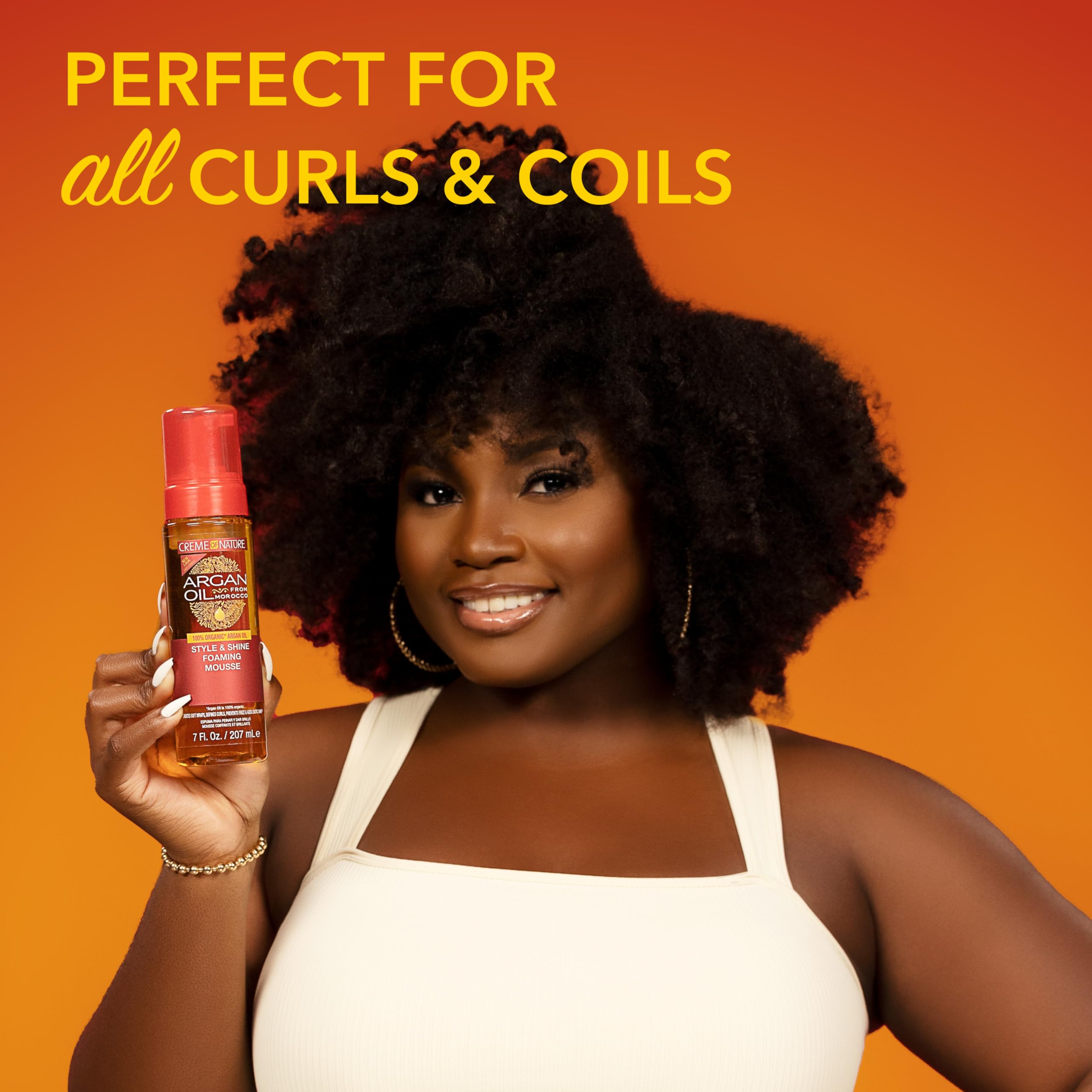 Lightweight anti frizz hair styling mousse by Creme of Nature for curly and wavy hair.