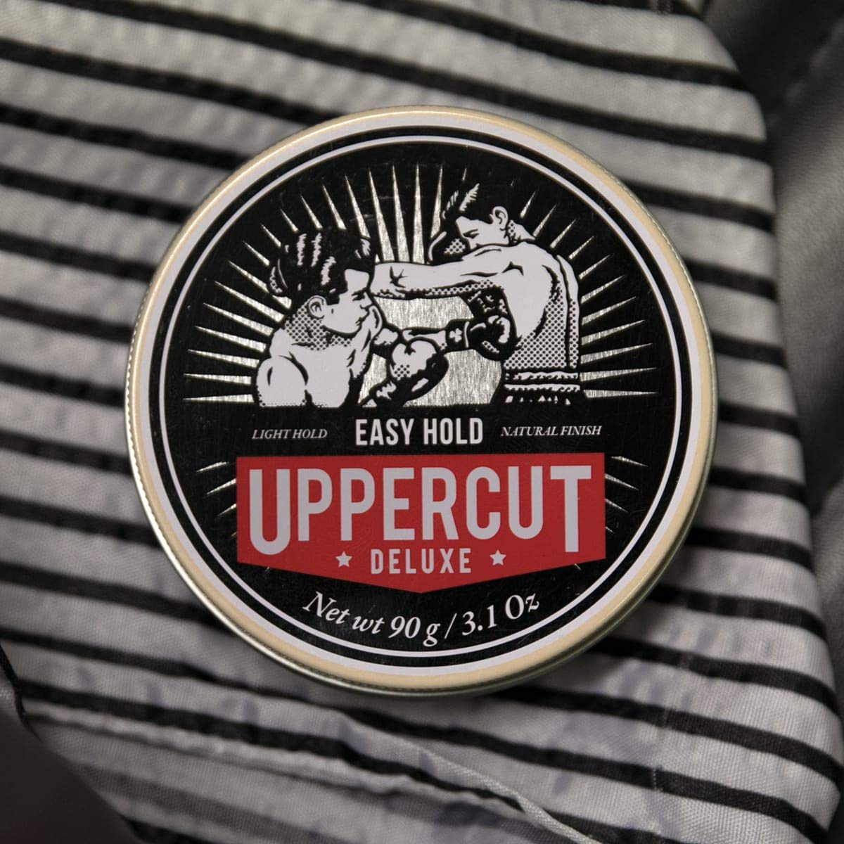 Side view of Uppercut Deluxe authentic USA styling cream product tin