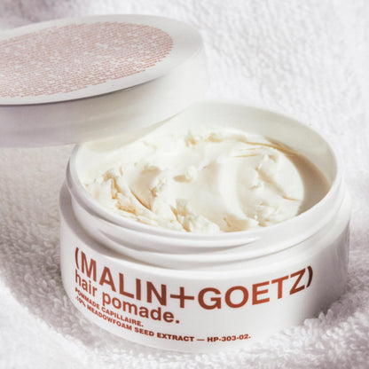 MALIN+GOETZ beeswax matte pomade packaging showing two ounces size