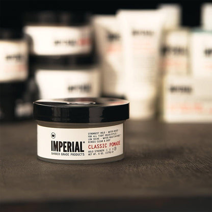 Imperial Barber Classic Pomade water based styling wax texture inside the open six ounce container.