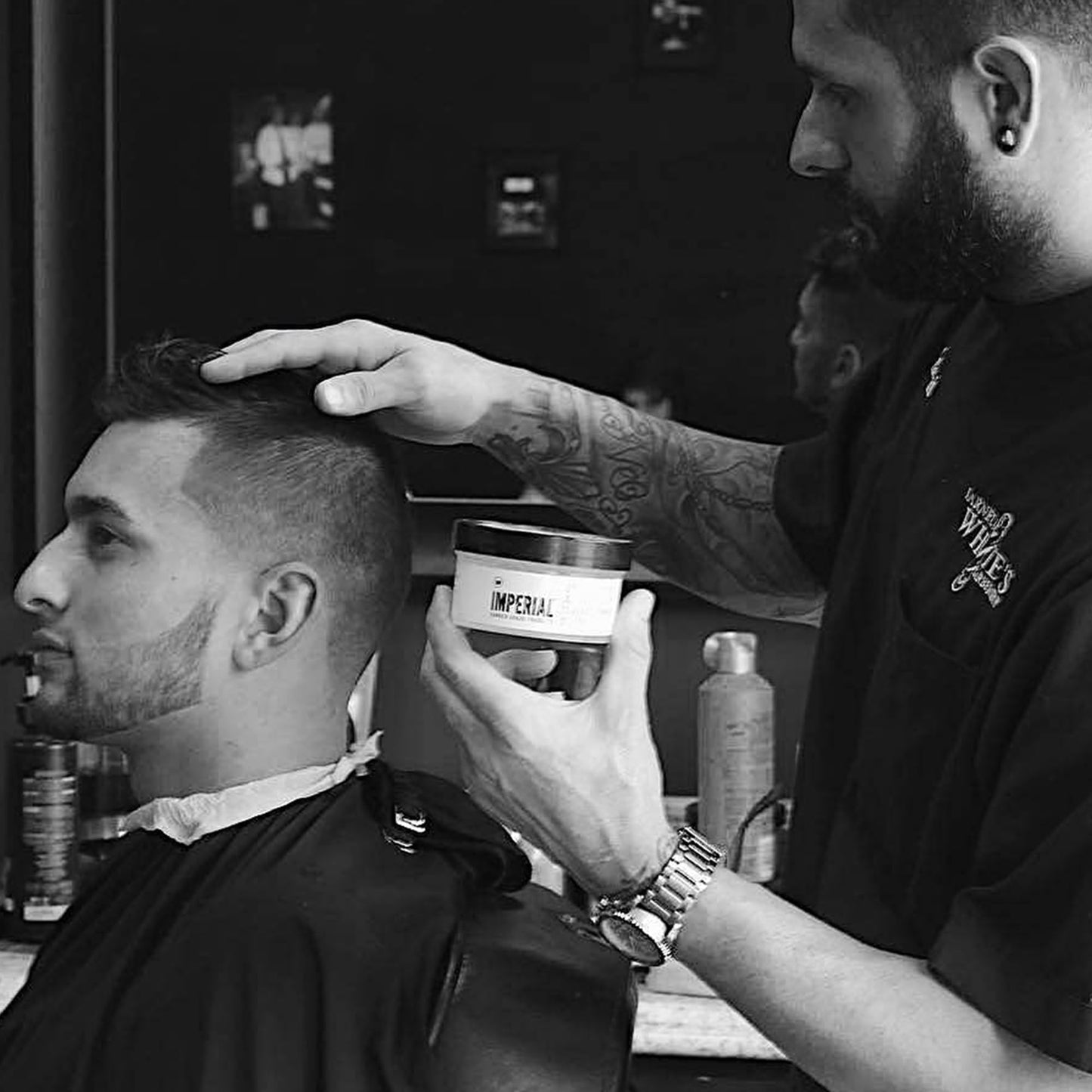 Back label of Imperial Barber Grade Products Classic Pomade detailing industrial strength hair styling ingredients.