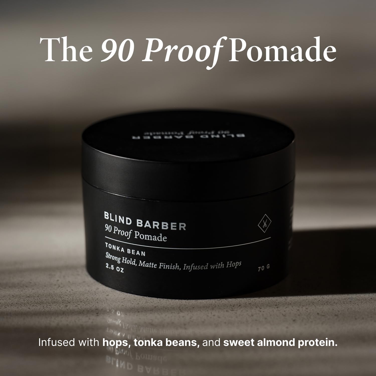 Water based matte pomade jar opened showing the creamy styling paste texture