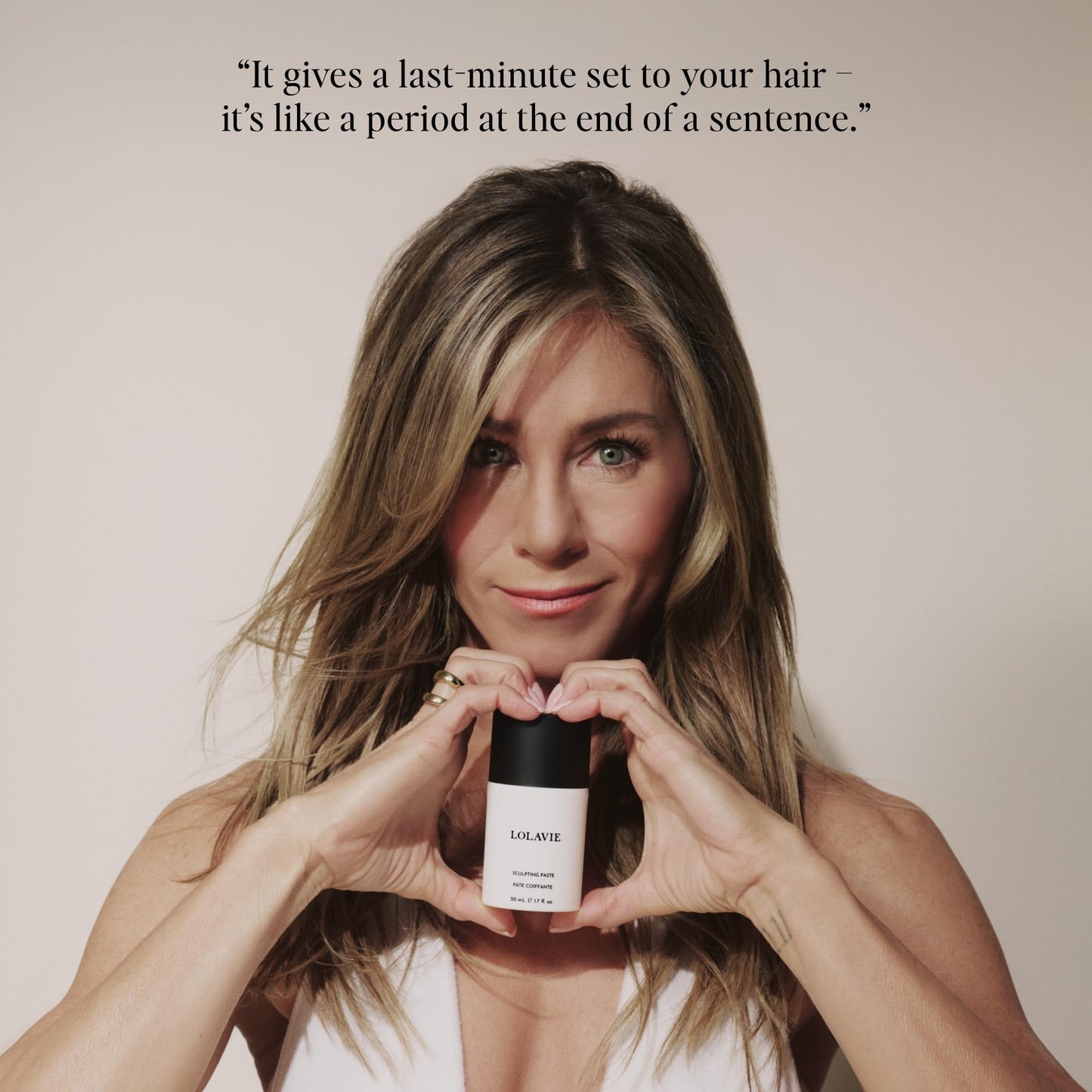 LolaVie frizz control hair paste container angled view