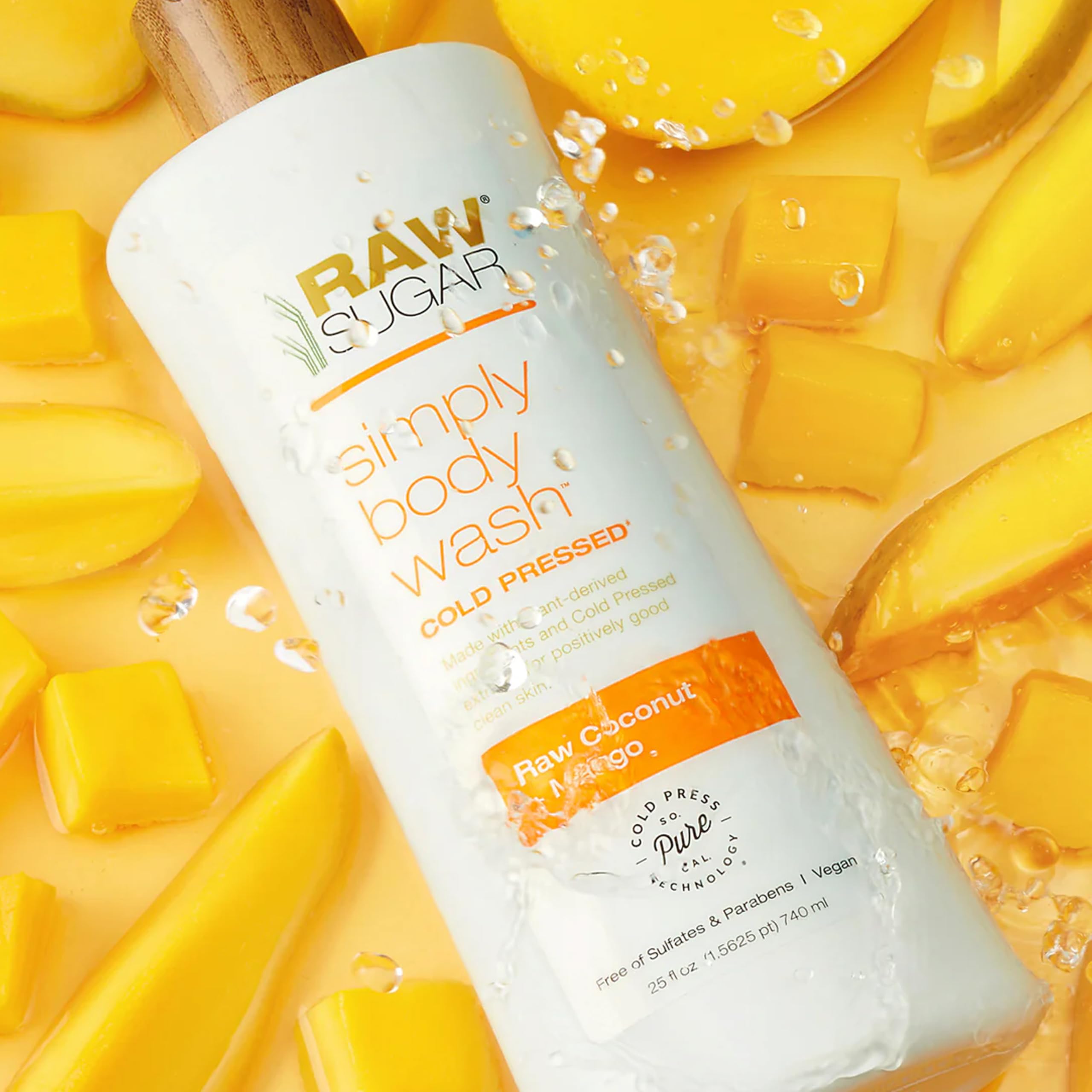 Raw Sugar body wash bottles featuring tropical scent labels