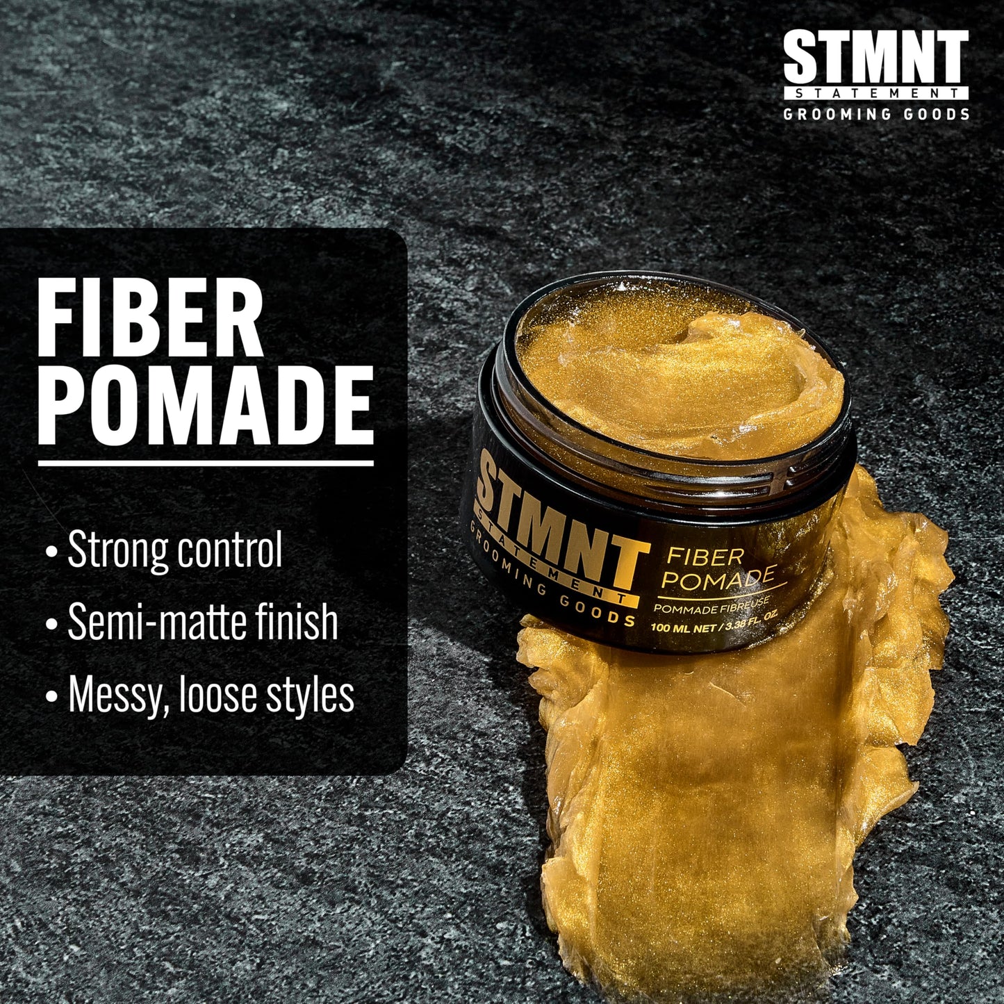 Side angle of STMNT Grooming Goods 3.38 Ounce jar highlighting product details and ingredients