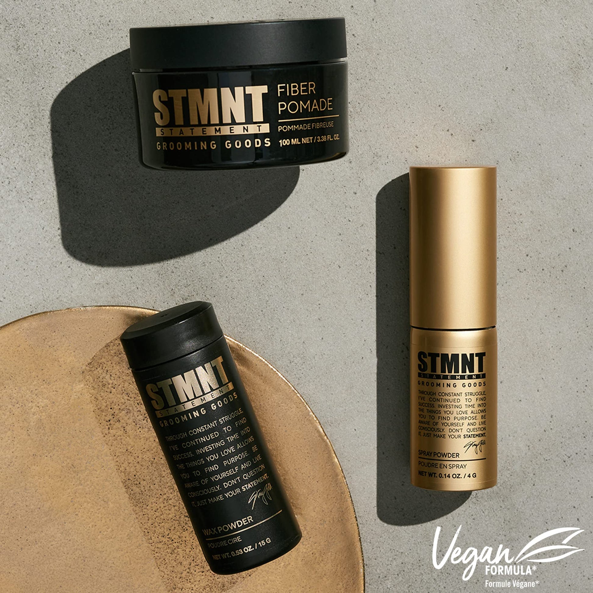 Premium imported STMNT hair styling pomade container on a clean background