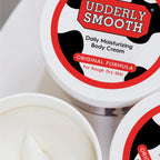Udderly Smooth non-greasy moisturizing cream applied on hands
