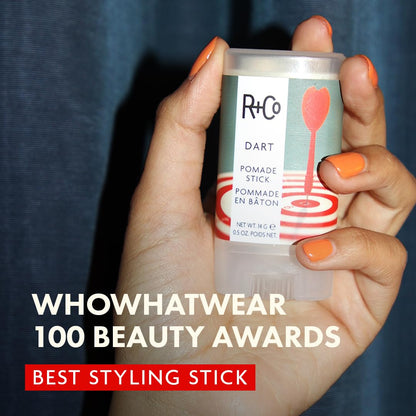 Compact travel friendly R+Co Dart pomade stick texture close up