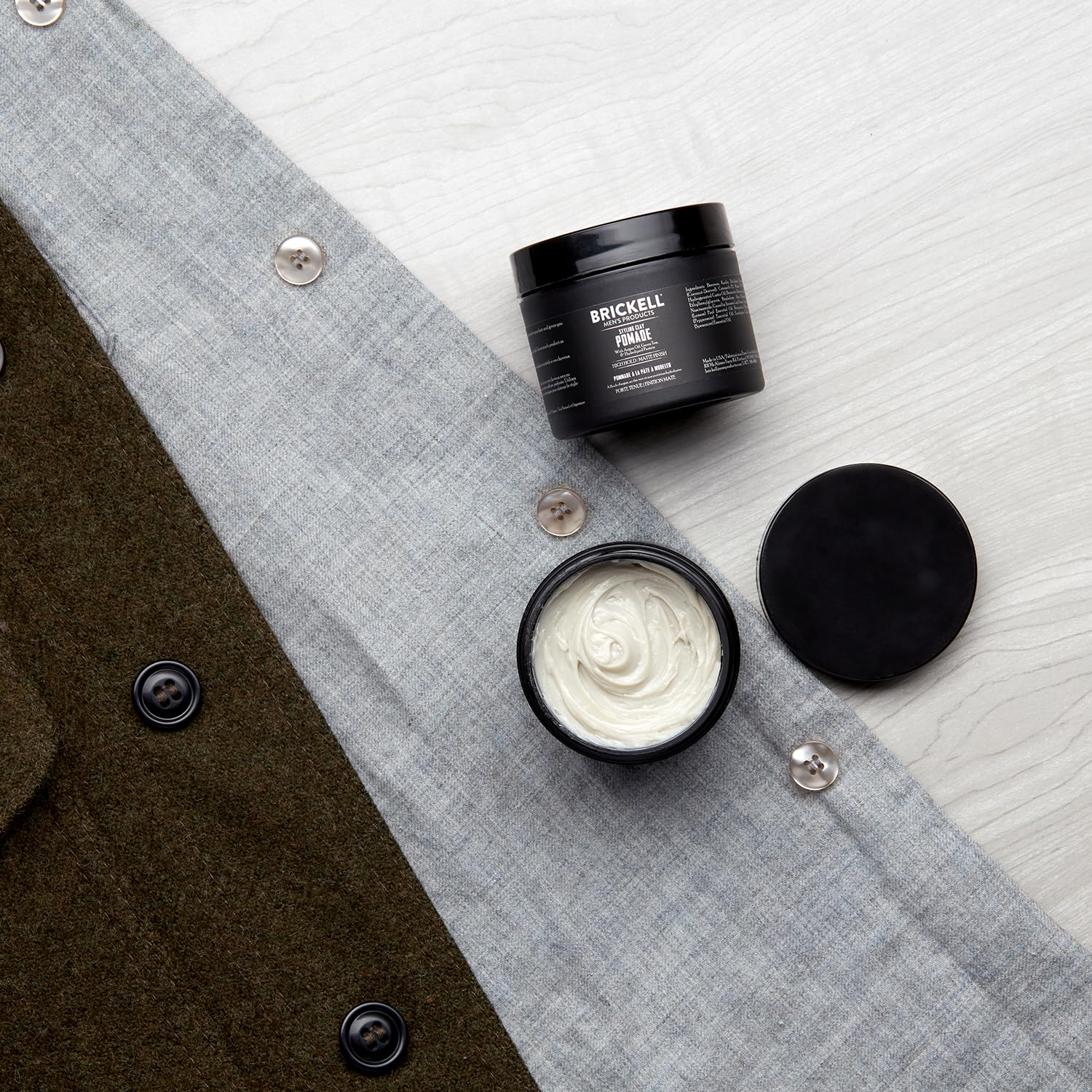 Brickell Men's Products Styling Clay Pomade open jar showing natural matte cream texture