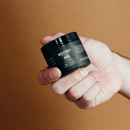 Brickell Men's Products matte finish hair pomade being applied for modern hairstyles