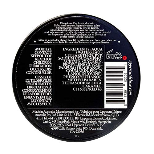 Open tin of Uppercut Deluxe Pomade highlighting the smooth water-soluble styling paste texture.