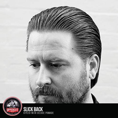 Authentic Uppercut Deluxe professional men's hair grooming product placed on a styling counter.